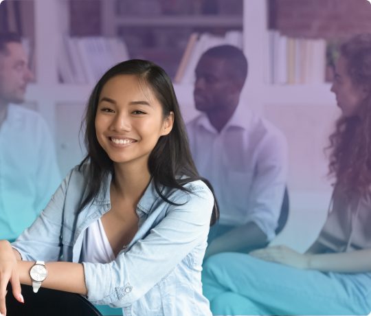 Woman smiling in group therapy